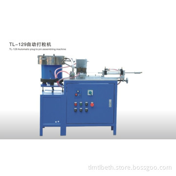Automatic plug and pin assembling machine